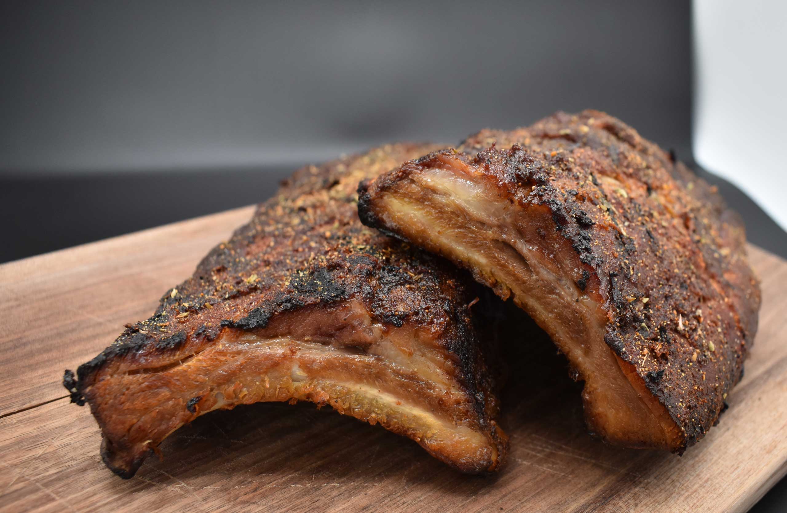 Dry-rubbed smoked baby back ribs at Smoky Rock BBQ